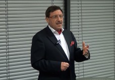 Maxim Behar giving a lecture on "The World in a Social Media Chaos"